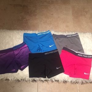 Bundle of 5 pairs of Nike compression shorts.